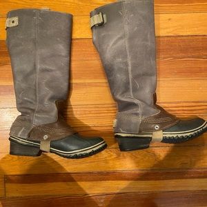 Sorel rain “riding” boots.
